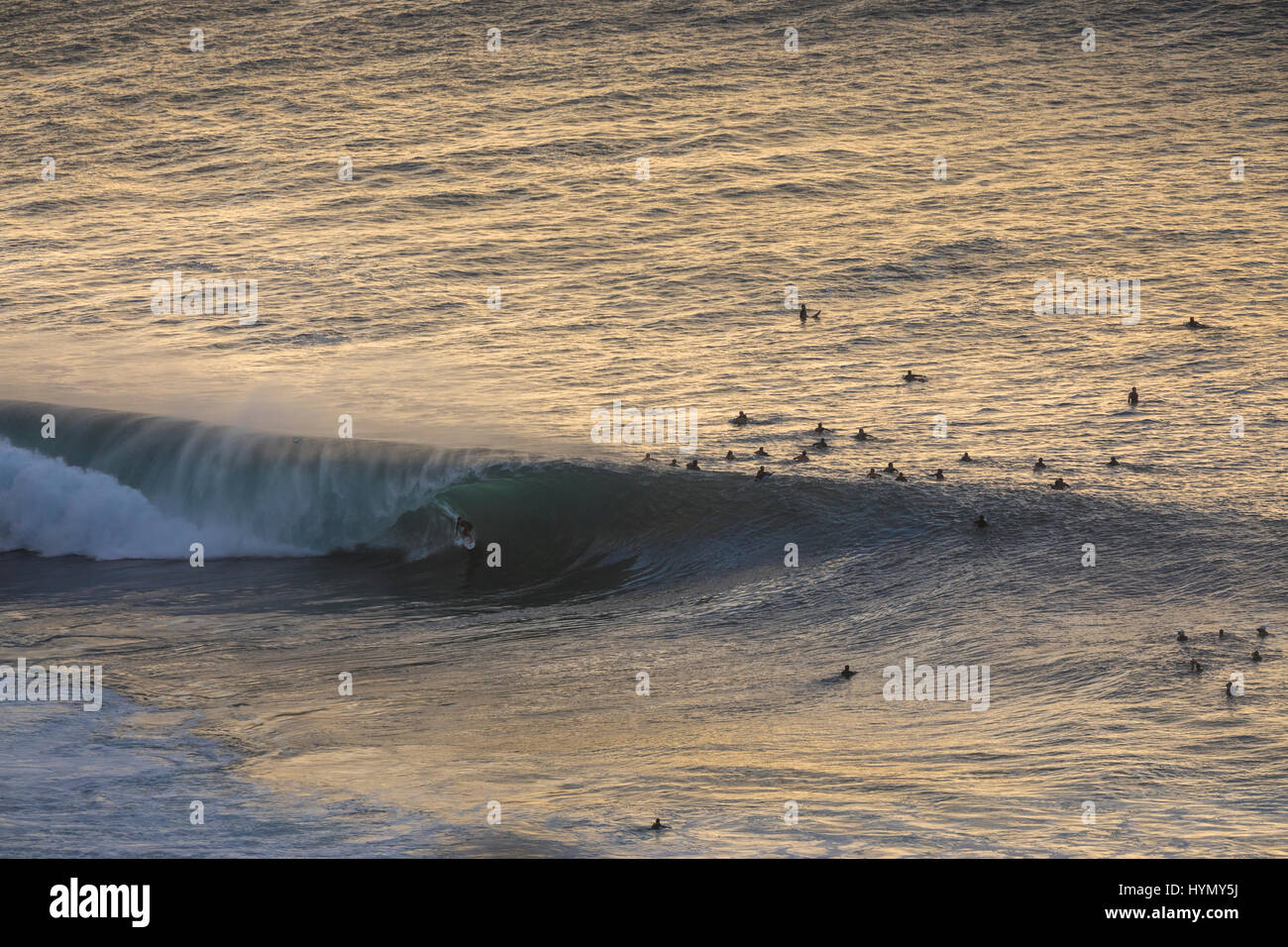 Catching a wave on a surfboard hi-res stock photography and images - Alamy