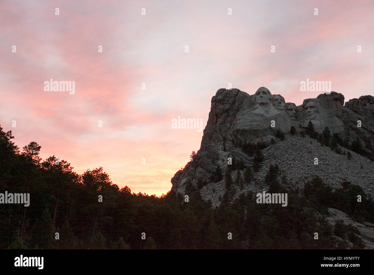 The Mount Rushmore National Memorial during a colorful sunset Stock