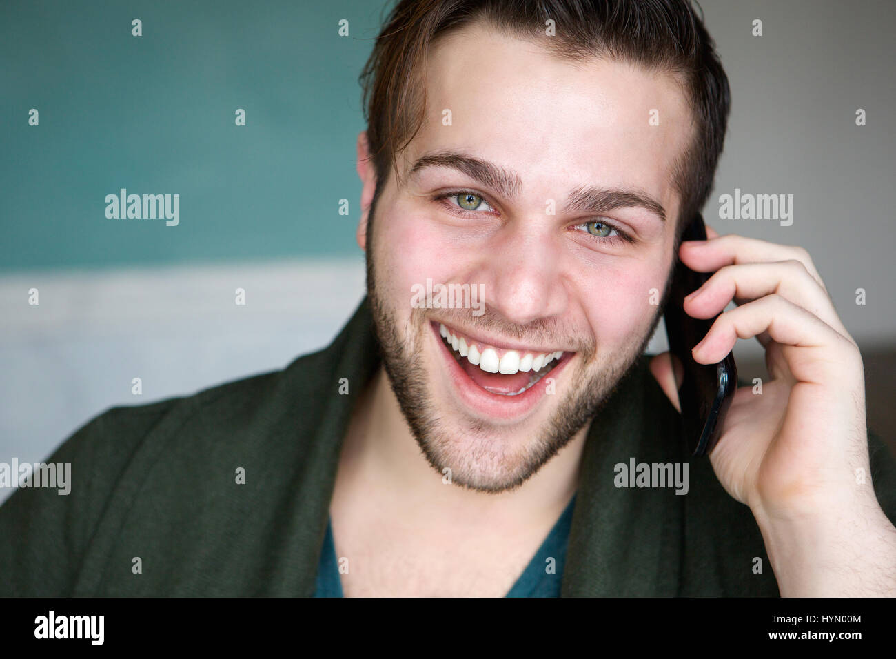 Attractive man smiling hi-res stock photography and images - Alamy