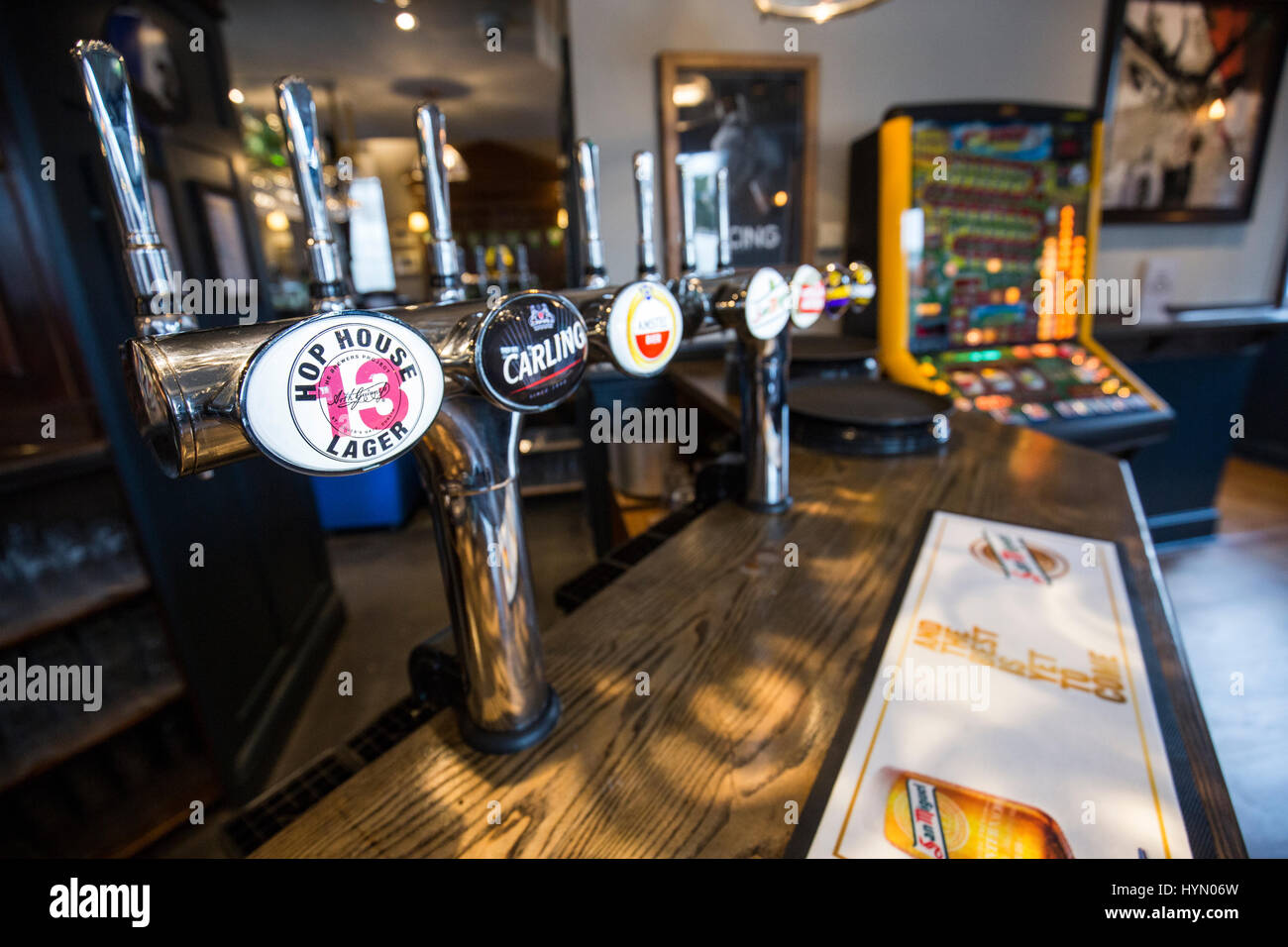 Drink taps in an English pub Stock Photo