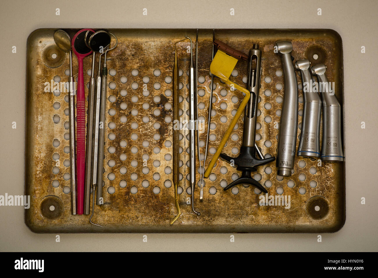 Metal tray with dental surgical instruments sterilized after dental procedure. Stock Photo