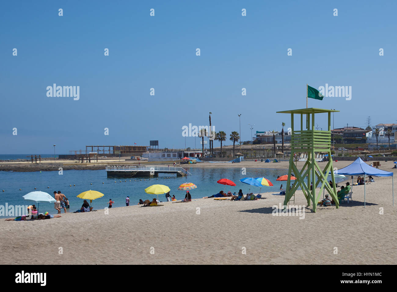Sandy beach on the Pacific Ocean in the port city of Arica, Chile Stock Photo