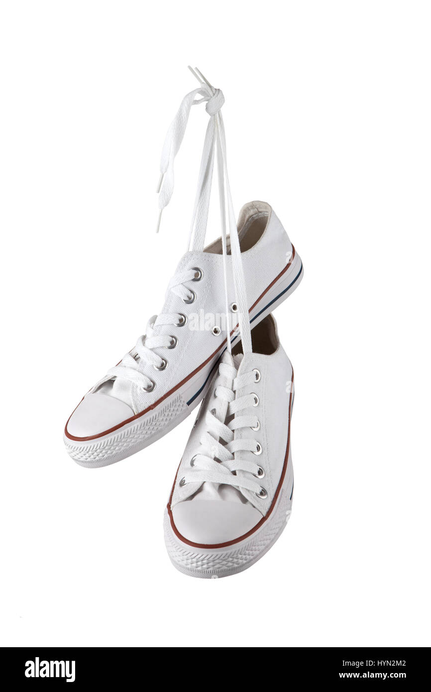Pair of new white sneakers isolated on white Stock Photo