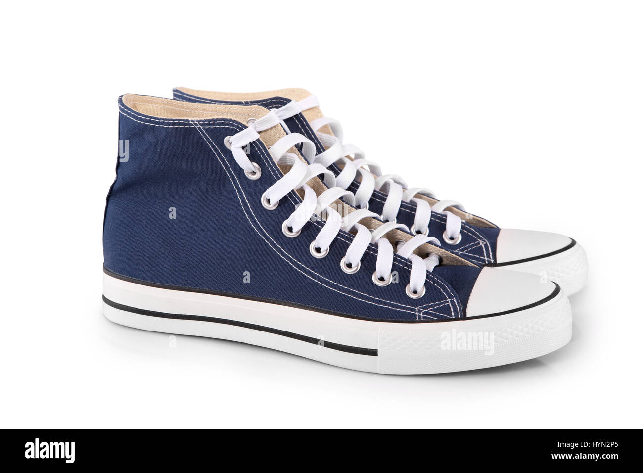 Pair of new blue sneakers on white background Stock Photo