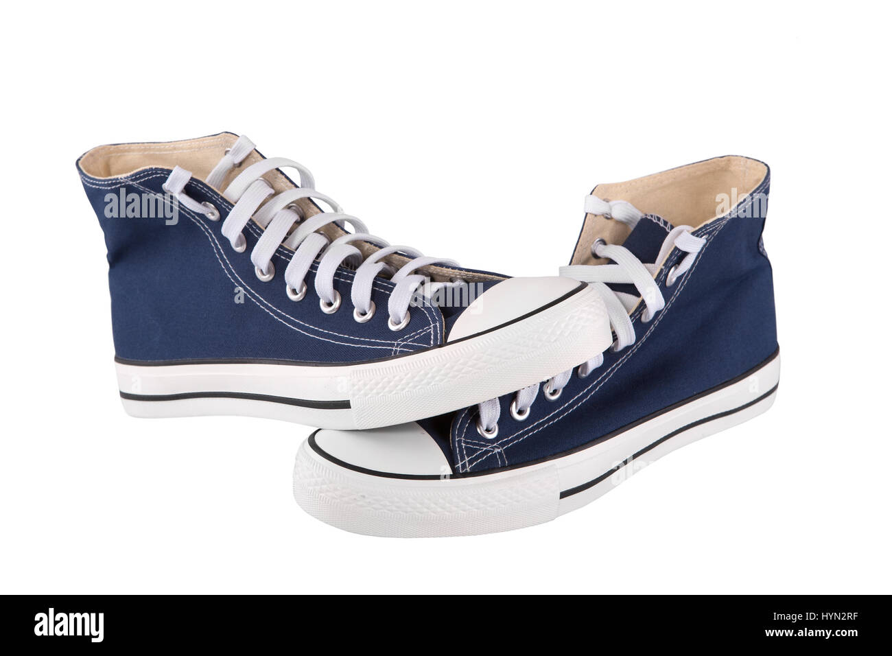 Pair of new blue sneakers on white background Stock Photo