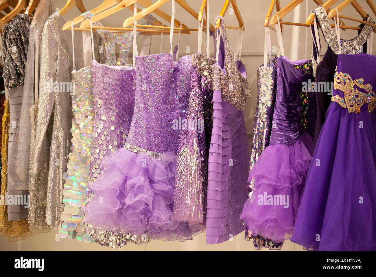 Glitter dresses in a closet/store Stock Photo Alamy