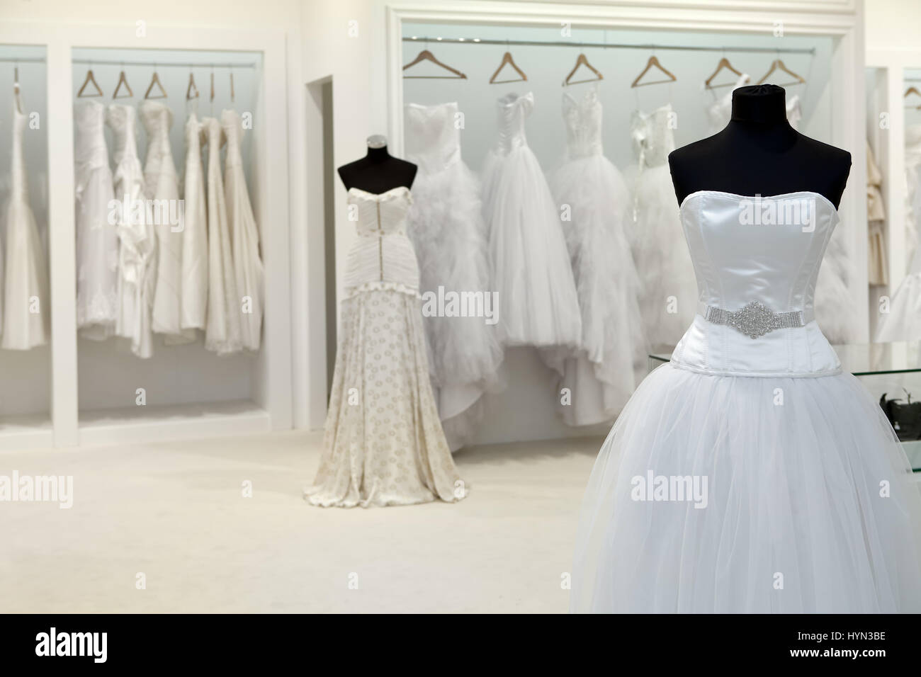 Bride clothes shop wedding dresses hires stock photography and images