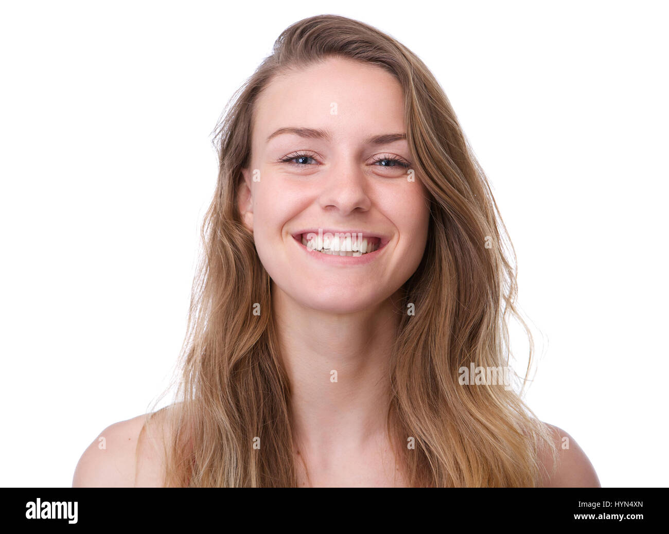 Close up portrait of a happy young woman with long hair smiling with ...