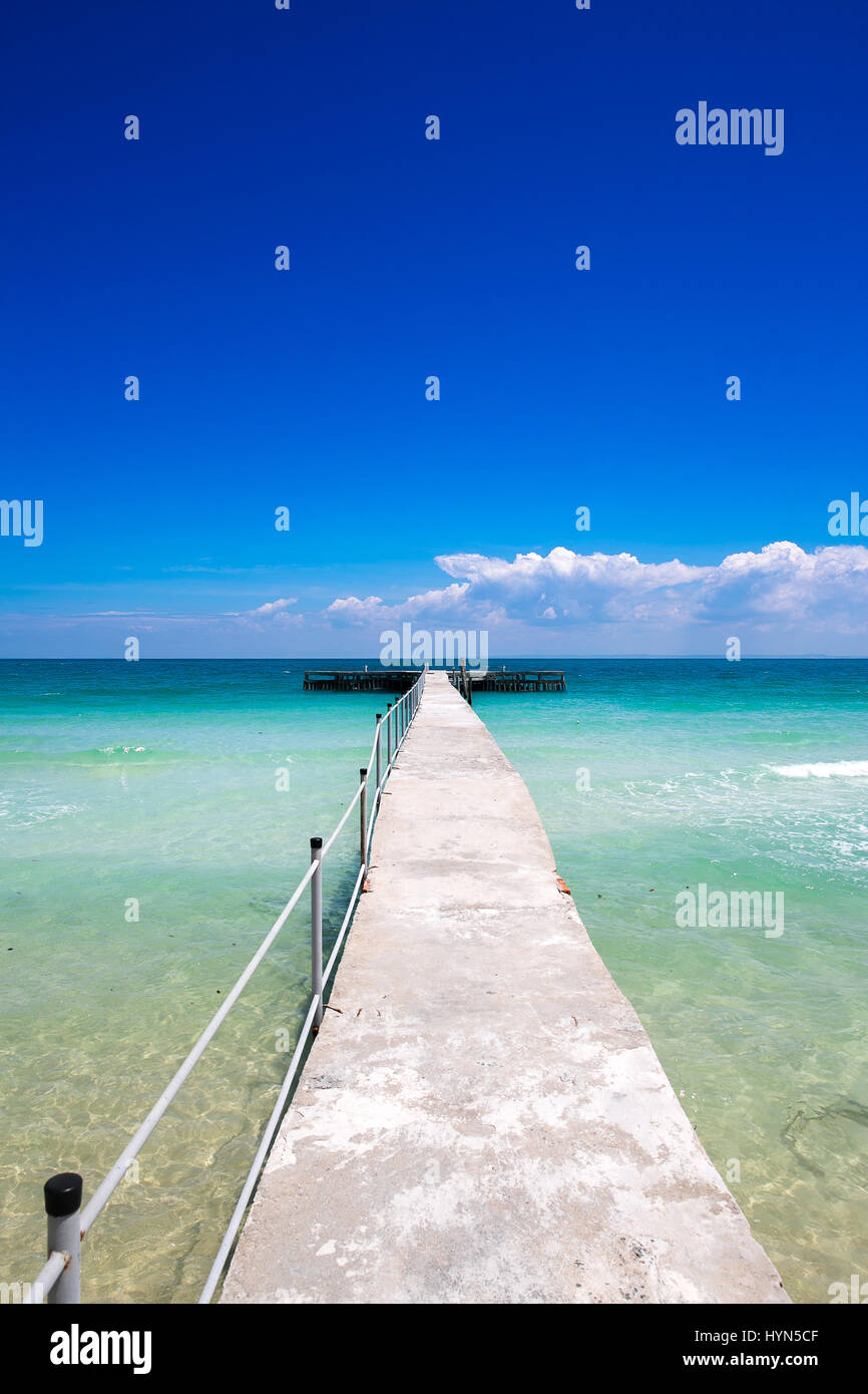 Blue paradise pier in Coconut Beach, Koh Rong Island, Cambodia, Southeast Asia Stock Photo