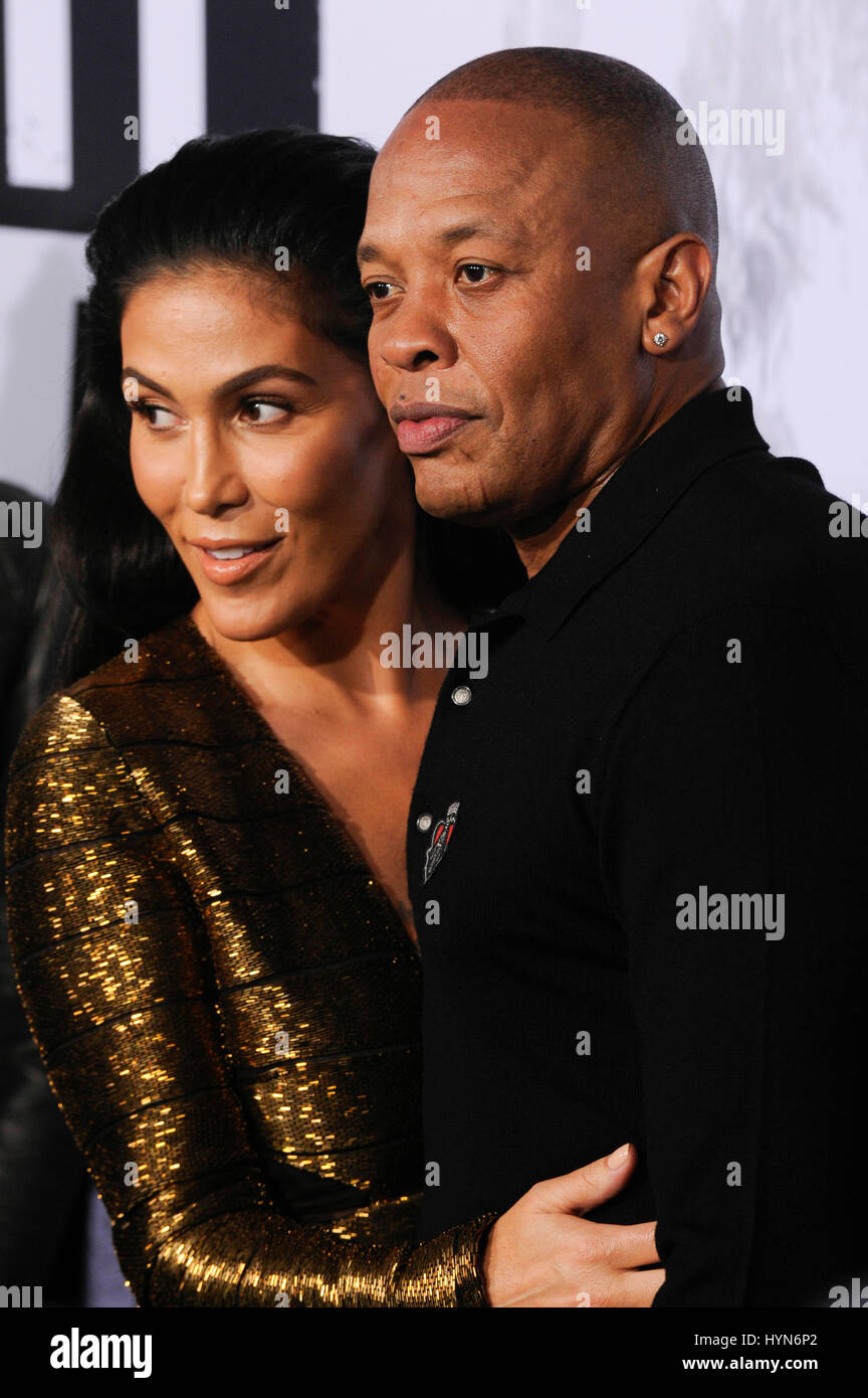 Dr. Dre and wife Nicole Threatt attend the Straight Outta Compton world