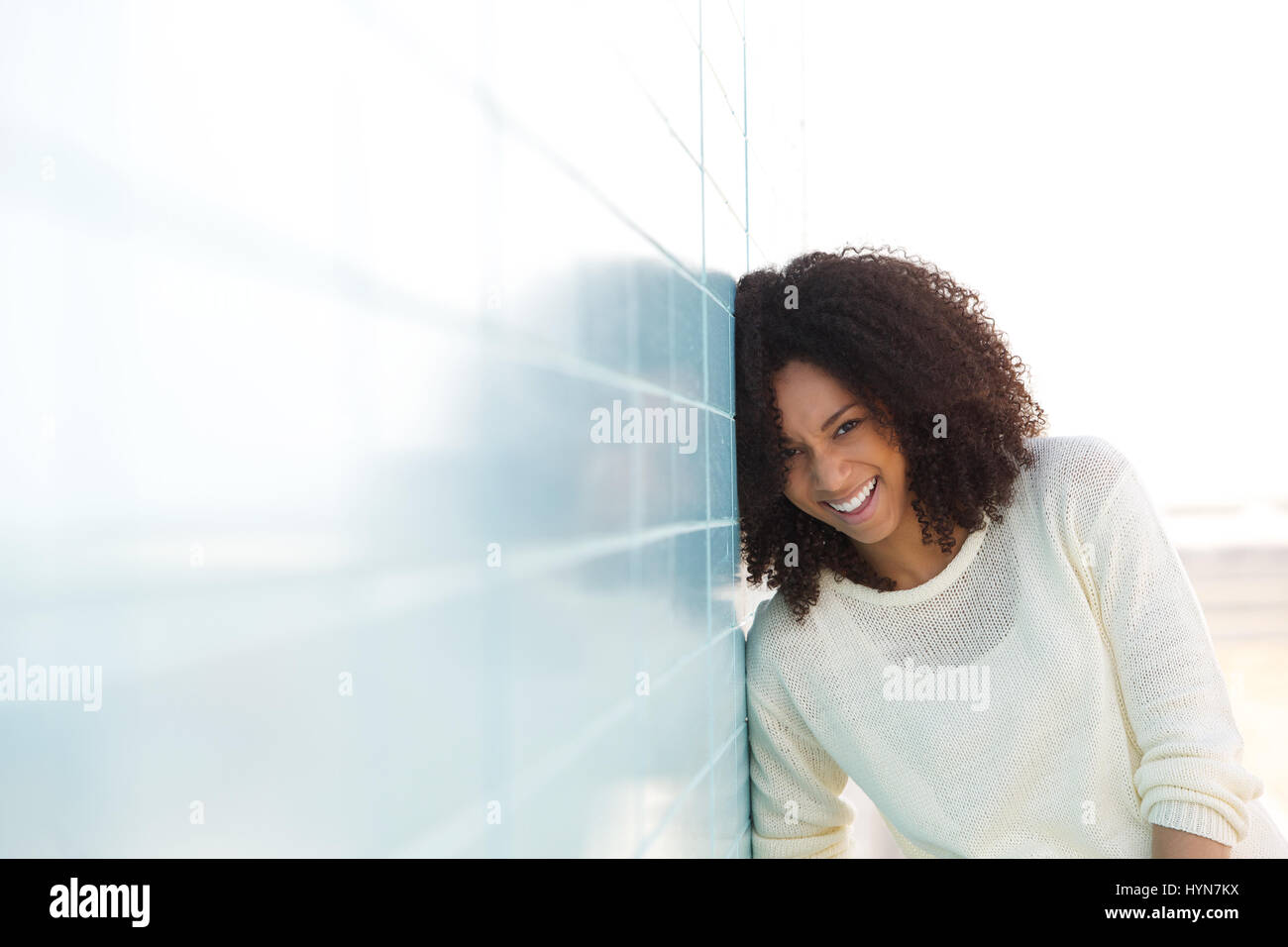 Close up portrait of a beautiful black woman laughing outdoors Stock ...