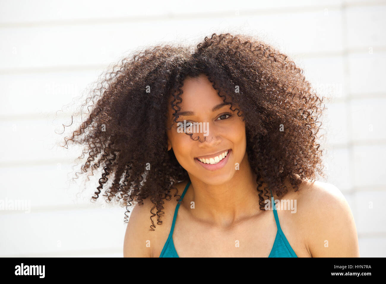 Close up portrait of a smiling woman posing outdoors Stock Photo - Alamy