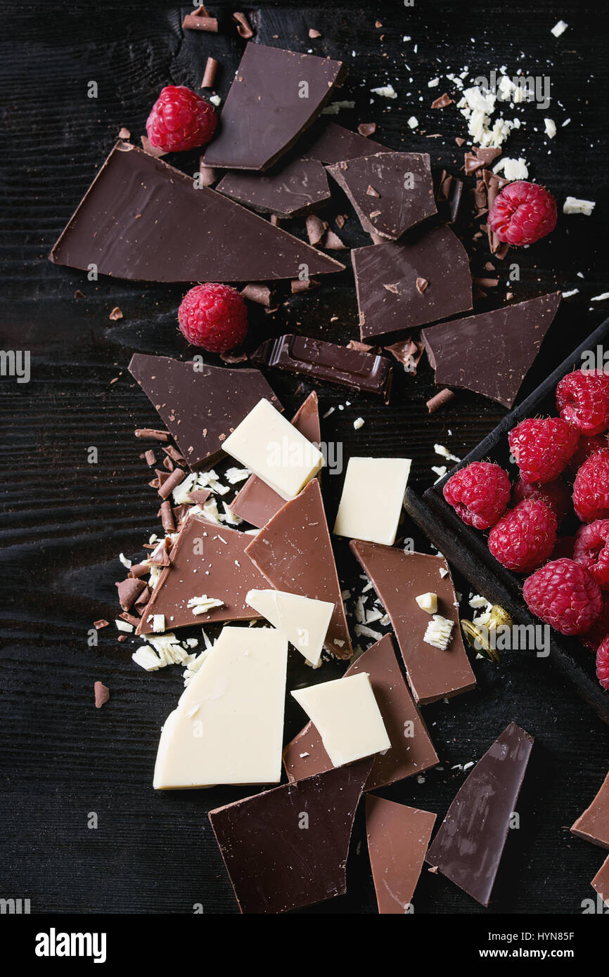 Variety of chopping chocolate with raspberries Stock Photo Alamy