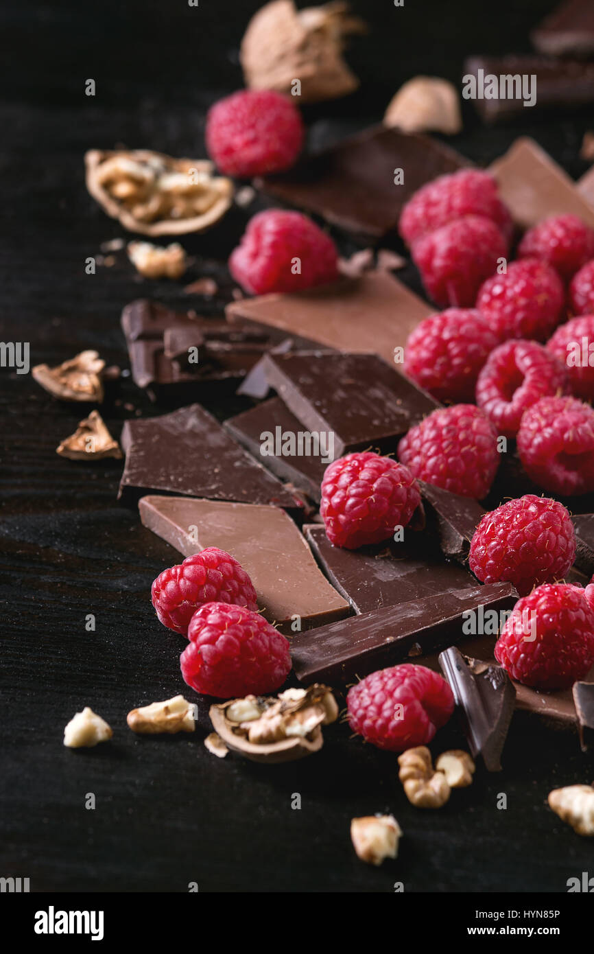 Variety of chopping chocolate with raspberries Stock Photo Alamy