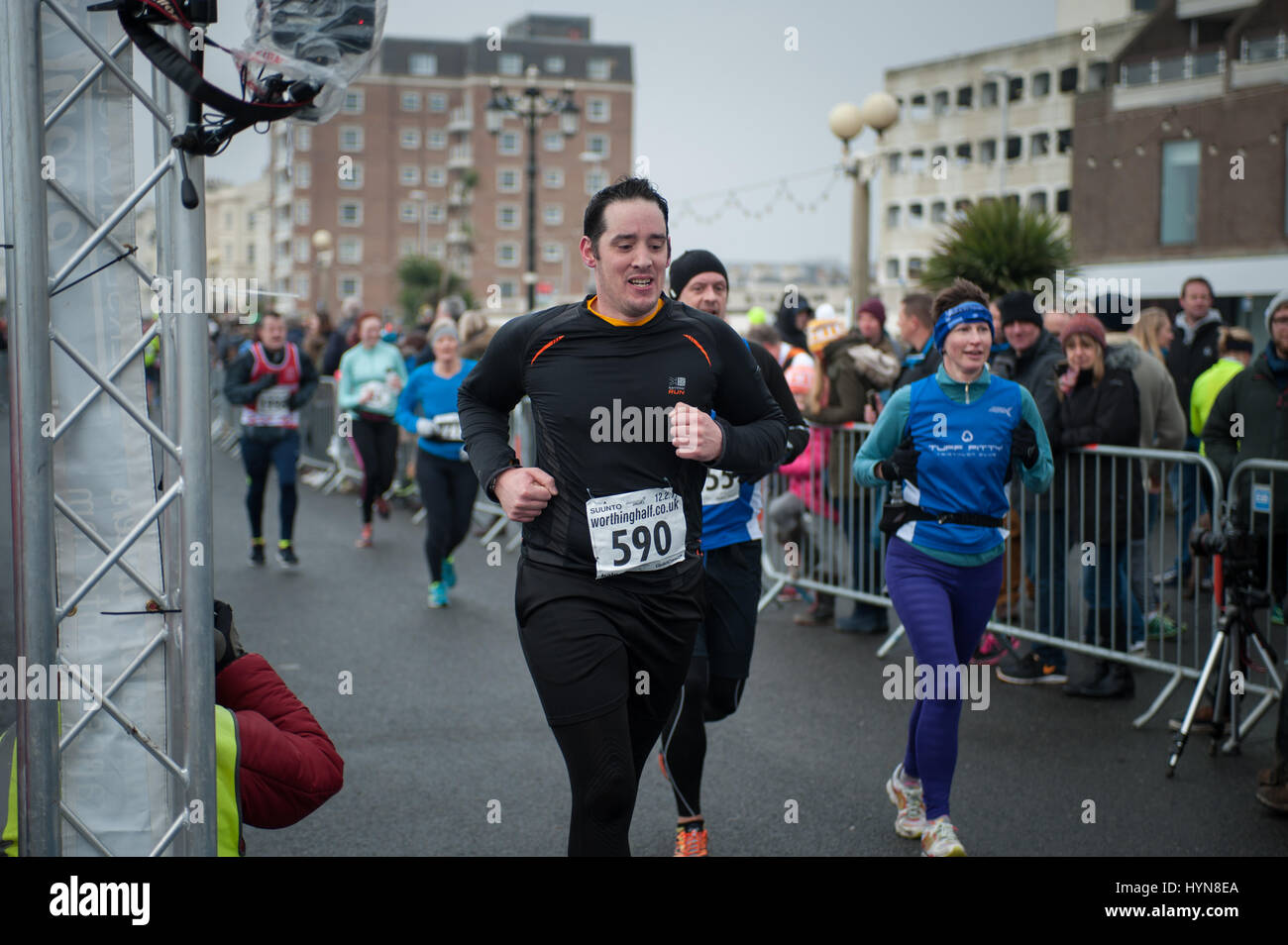 Tired And Exhausted Runners Cross The Finish Line During The Worthing Half Marathon In Worthing West Sussex Uk Stock Photo Alamy