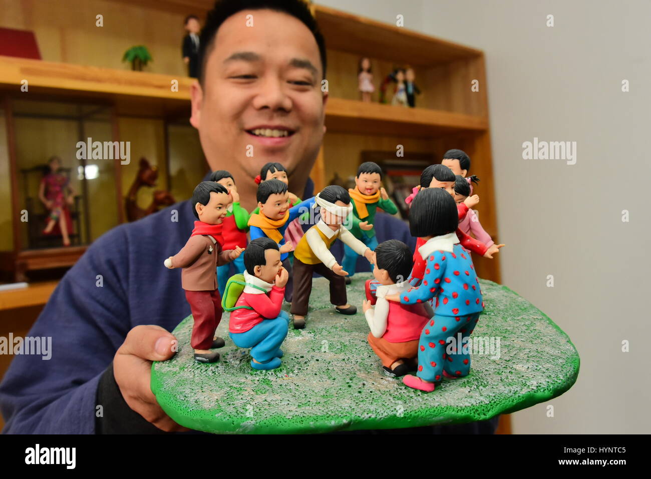 Zhengzhou, Zhengzhou, China. 5th Apr, 2017. Zhengzhou, CHINA-April 5 2017: (EDITORIAL USE ONLY. CHINA OUT) The folk artist Jia Guanghui shows his handmade clay figurines in Zhengzhou, central China's Henan Province, April 5th, 2017. Jia has been making clay figurines for twenty years, creating vivid figurines of celebrities including Jackie Chan, Barack and Michelle Obama. Jia also made figurines of characters in Chinese classic literature works including Dream of the Red Chamber and Heroes of the Marshes. Credit: SIPA Asia/ZUMA Wire/Alamy Live News Stock Photo