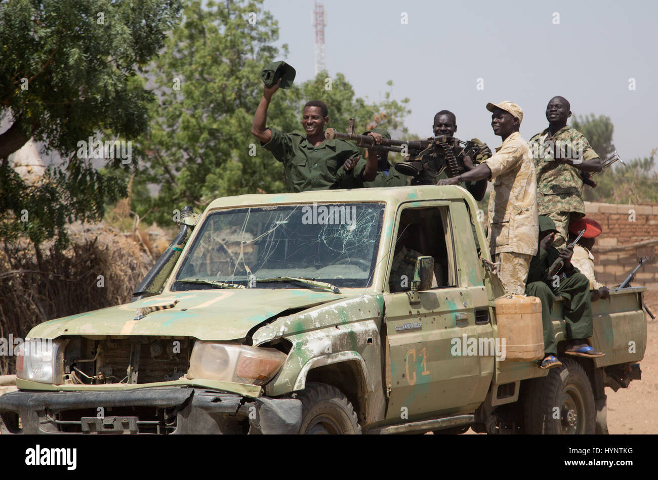 Heiban, Sudan. 12th Feb, 2017. Fighters of the SPLA-N stand on a pick-up truck in Heiban, Sudan, 12 February 2017. The Nuba mountains are held by the Sudanese Liberation Army and their political branch (SPLM-N). Photo: Laura Wagenknecht/dpa/Alamy Live News Stock Photo