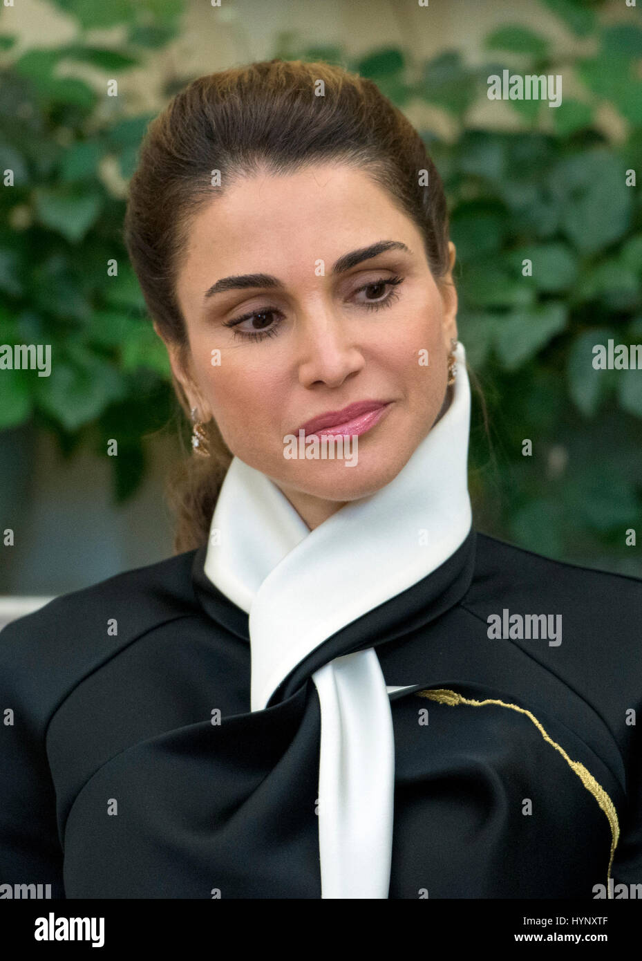 Washington, Us. 05th Apr, 2017. Queen Rania of Jordan looks on as United States President Donald J. Trump meets King Abdullah II of Jordan in the Oval Office of the White House in Washington, DC on Wednesday, April 5, 2017. Credit: Ron Sachs/Pool via CNP - NO WIRE SERVICE - Photo: Ron Sachs/Consolidated News Photos/Ron Sachs - Pool via CNP/dpa/Alamy Live News Stock Photo