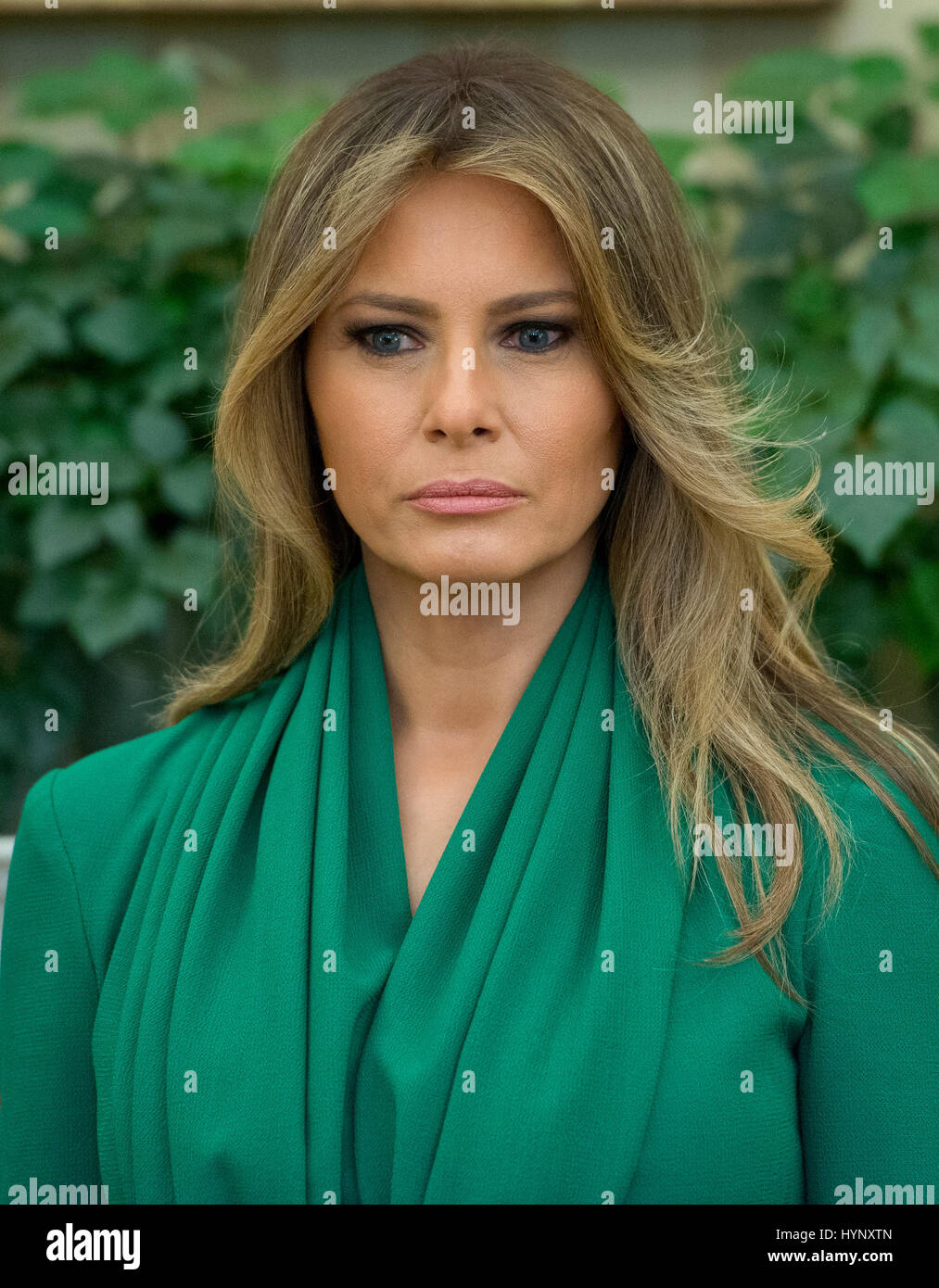 Washington, Us. 05th Apr, 2017. First lady Melania Trump stands as United States President Donald J. Trump meets King Abdullah II of Jordan in the Oval Office of the White House in Washington, DC on Wednesday, April 5, 2017. Credit: Ron Sachs/Pool via CNP - NO WIRE SERVICE - Photo: Ron Sachs/Consolidated News Photos/Ron Sachs - Pool via CNP/dpa/Alamy Live News Stock Photo
