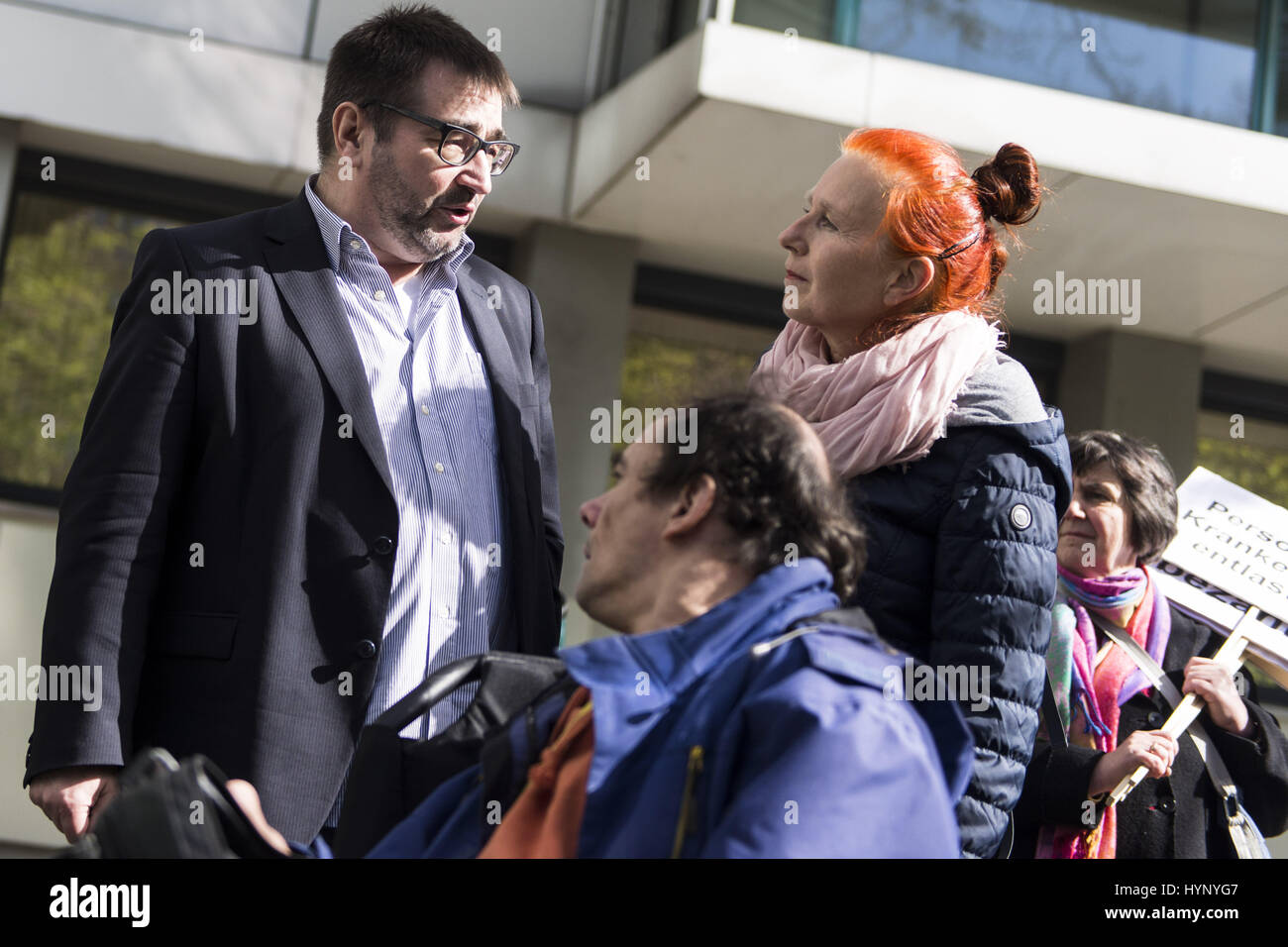 Berlin, Germany. 6th Apr, 2017. City councilor KNUT MILDNER-SPINDLER (Left Party) in conversation with disability rights activists and their assistants two days after about the occupation of the town hall in Friedrichshain-Kreuzberg. The demonstrators make the Berlin district of Friedrichshain-Kreuzberg responsible for the currently very tense economic situation of the assistance service 'ambulante dienste' because of unpaid bills for services already provided support services in hospitals. Credit: ZUMA Press, Inc./Alamy Live News Stock Photo