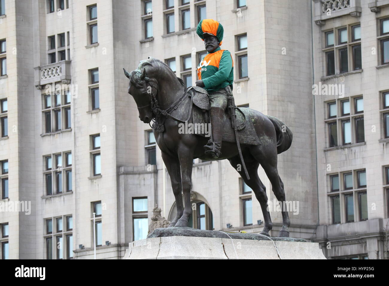 Liverpool, UK. 6th Apr, 2017. King Edward VII monument at pier head Liverpool decked out in jockey racing colours by ITV racing in preparation for the Grand National at Aintree, Pier Head, Liverpool, 6th April 2017. Credit: Radharc Images/Alamy Live News Stock Photo