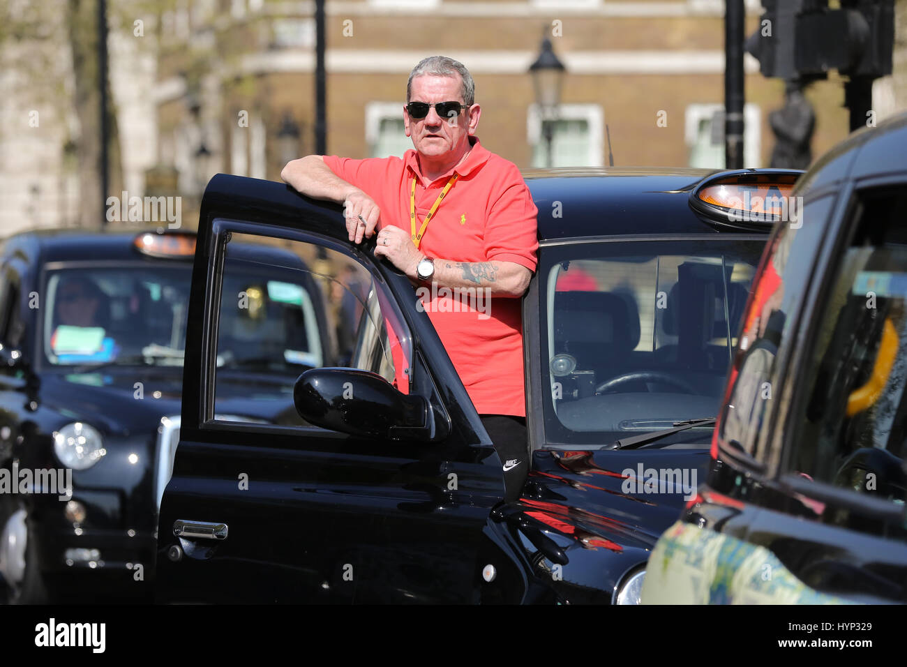 Whitehall. London. UK 6 Apr 2017. London Black Taxi drivers protest in London's Whitehall. The cabbies are demanding a parliamentary enquiry into the alleged relationship between former Prime Minister David Cameron and George Osborne and their links to private hire company Uber. Credit: Dinendra Haria/Alamy Live News Stock Photo