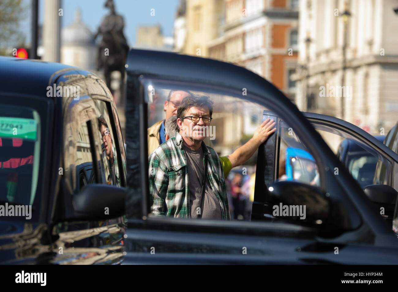 Whitehall. London. UK 6 Apr 2017. London Black Taxi drivers protest in London's Whitehall. The cabbies are demanding a parliamentary enquiry into the alleged relationship between former Prime Minister David Cameron and George Osborne and their links to private hire company Uber. Credit: Dinendra Haria/Alamy Live News Stock Photo