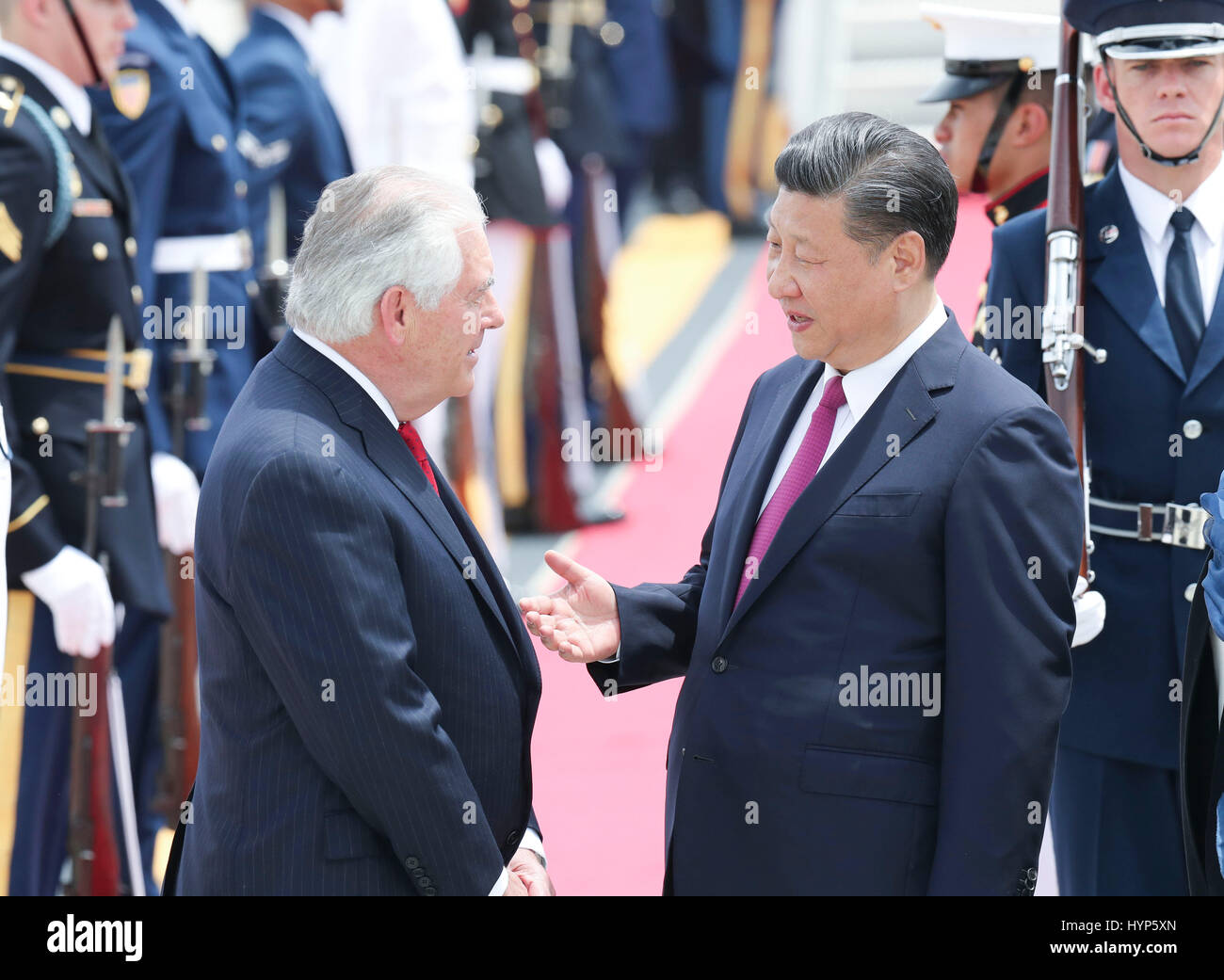 Palm Beach, USA. 6th Apr, 2017. Chinese President Xi Jinping and his wife Peng Liyuan are welcomed by U.S. Secretary of State Rex Tillerson and his wife upon their arrival at Palm Beach International Airport in Florida, the United States, April 6, 2017. Xi arrived here for the first meeting with U.S. President Donald Trump. Credit: Ding Lin/Xinhua/Alamy Live News Stock Photo