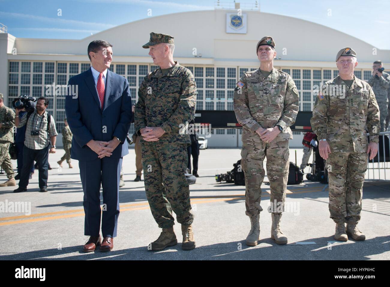 U.S. National Security Advisor Michael Flynn, left, Joint Chiefs Chairman Joseph Dunford, Central Command General Joseph Votel, and Special Operations Command Commander Tony Thomas await the arrival of U.S. President Donald Trump at the MacDill Air Force Base February 6, 2017 near Tampa, Florida. Stock Photo