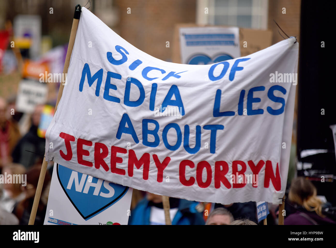 Fake news media lies comment on a banner supporting Jeremy Corbyn stating 'Sick of media lies about Jeremy Corbyn' Stock Photo