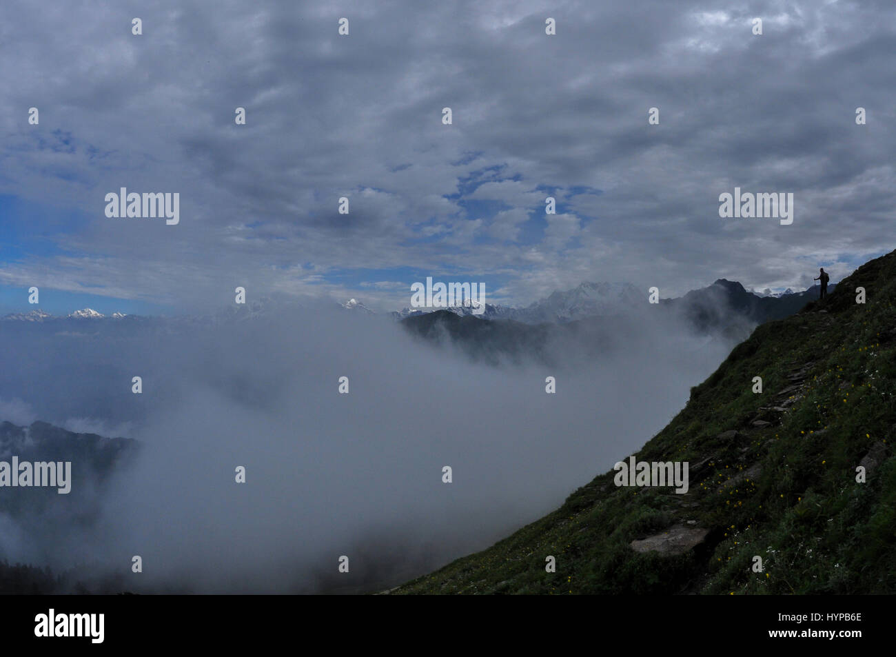 Tungnath, Chopta, Uttarakhand, India- August 3, 2011: Cloudy Snow covered Himalayan ranges seen form  the Tungnath temple Complex,  at Tungnath, Chopt Stock Photo