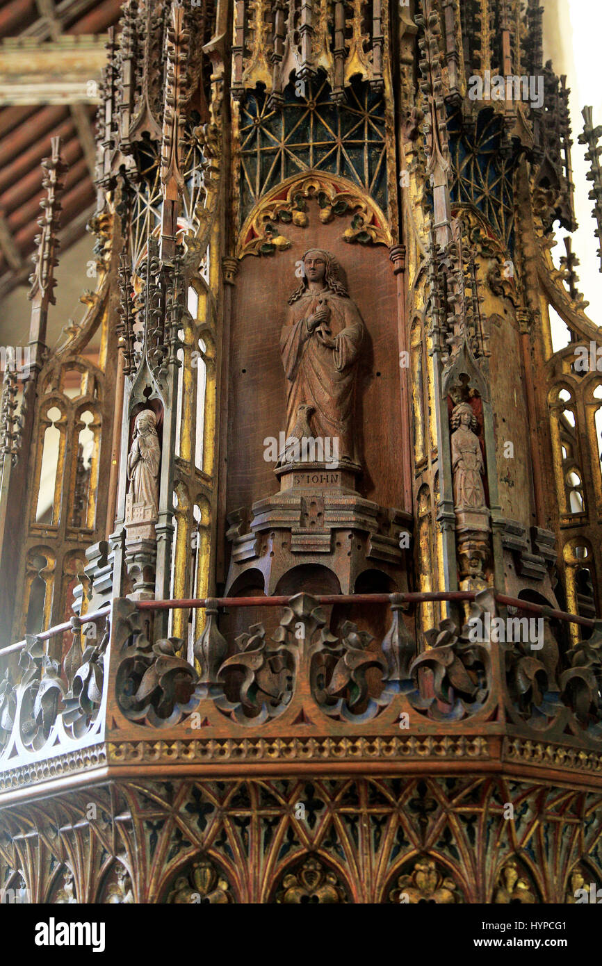 Ornately decorated large wooden baptismal font cover Ufford church