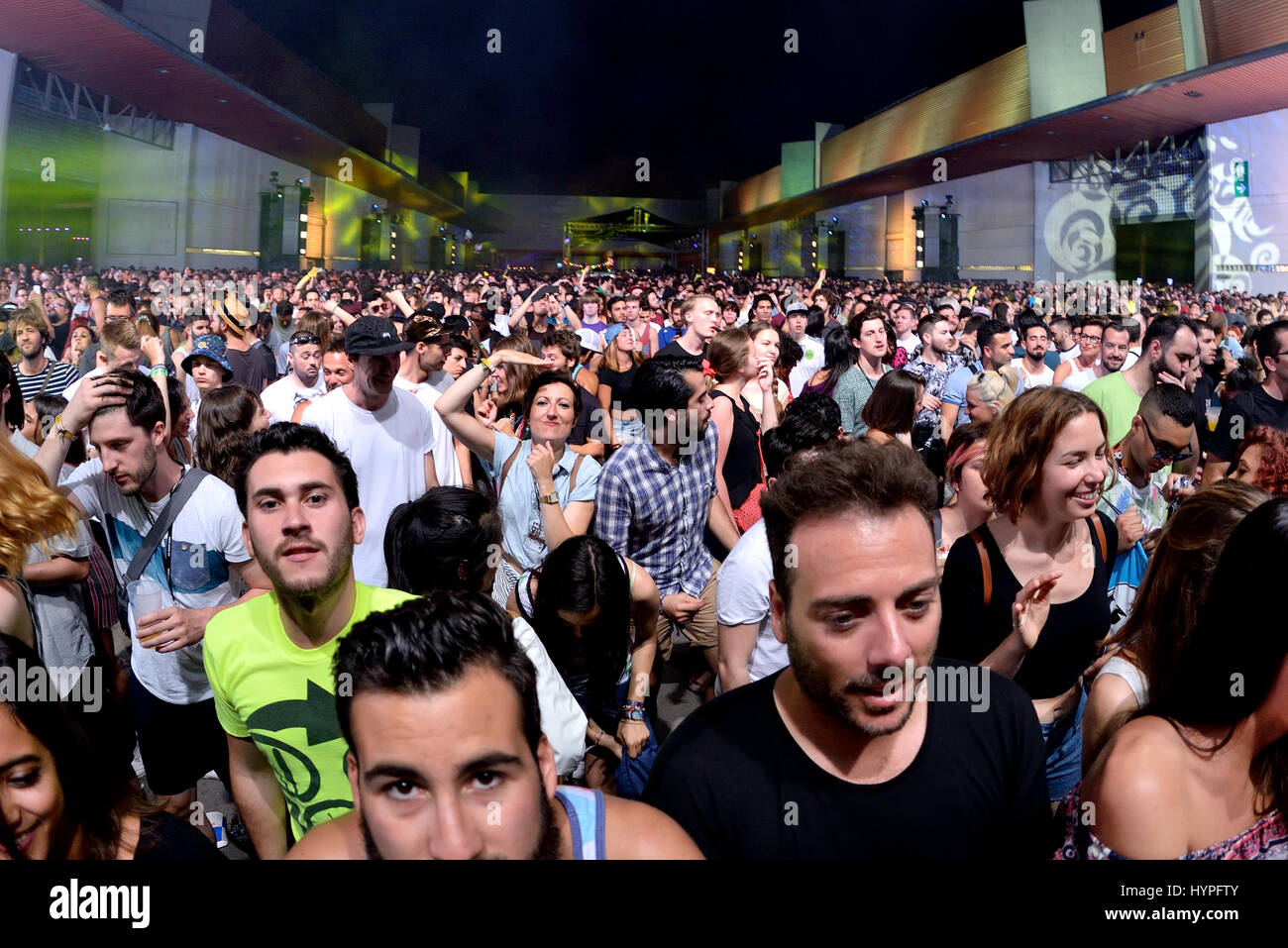 BARCELONA - JUN 19: Crowd dance in a concert at Sonar Festival on June 19, 2015 in Barcelona, Spain. Stock Photo