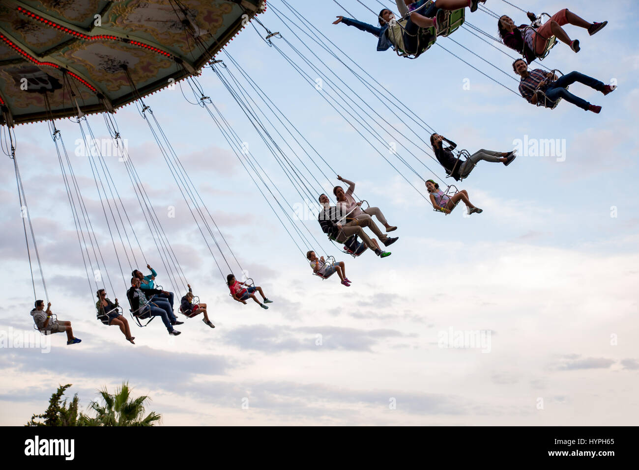 BARCELONA SEP 5 People have fun at the carousel flying swing ride