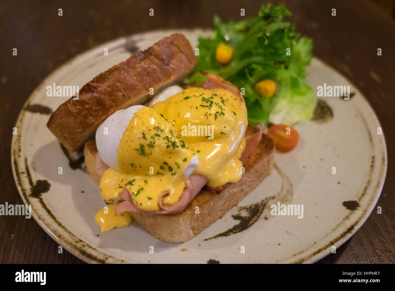 Eggs Benedict with Whole wheat toast, Poached eggs, Hoallandaise sauce