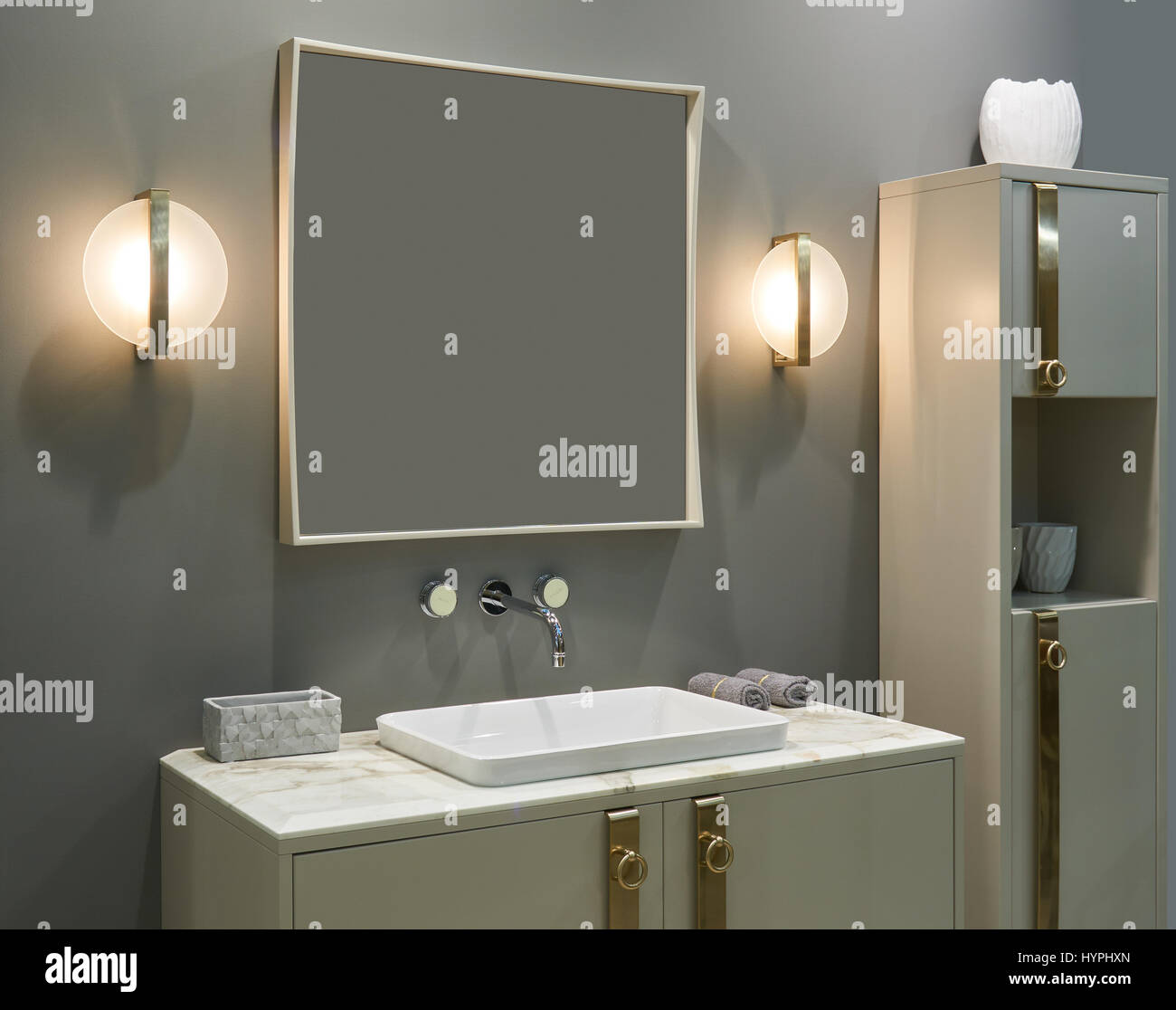 Luxury Interior Bathroom Wall Mounted Mixer Inset Washbasin Large Mirror Electric Lamps And Furniture Stock Photo Alamy