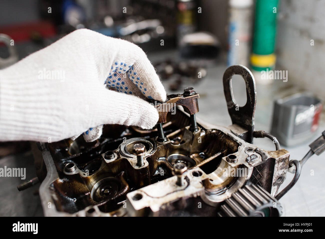 Engine crankshaft, valve cover, pistons. mechanic repairman at