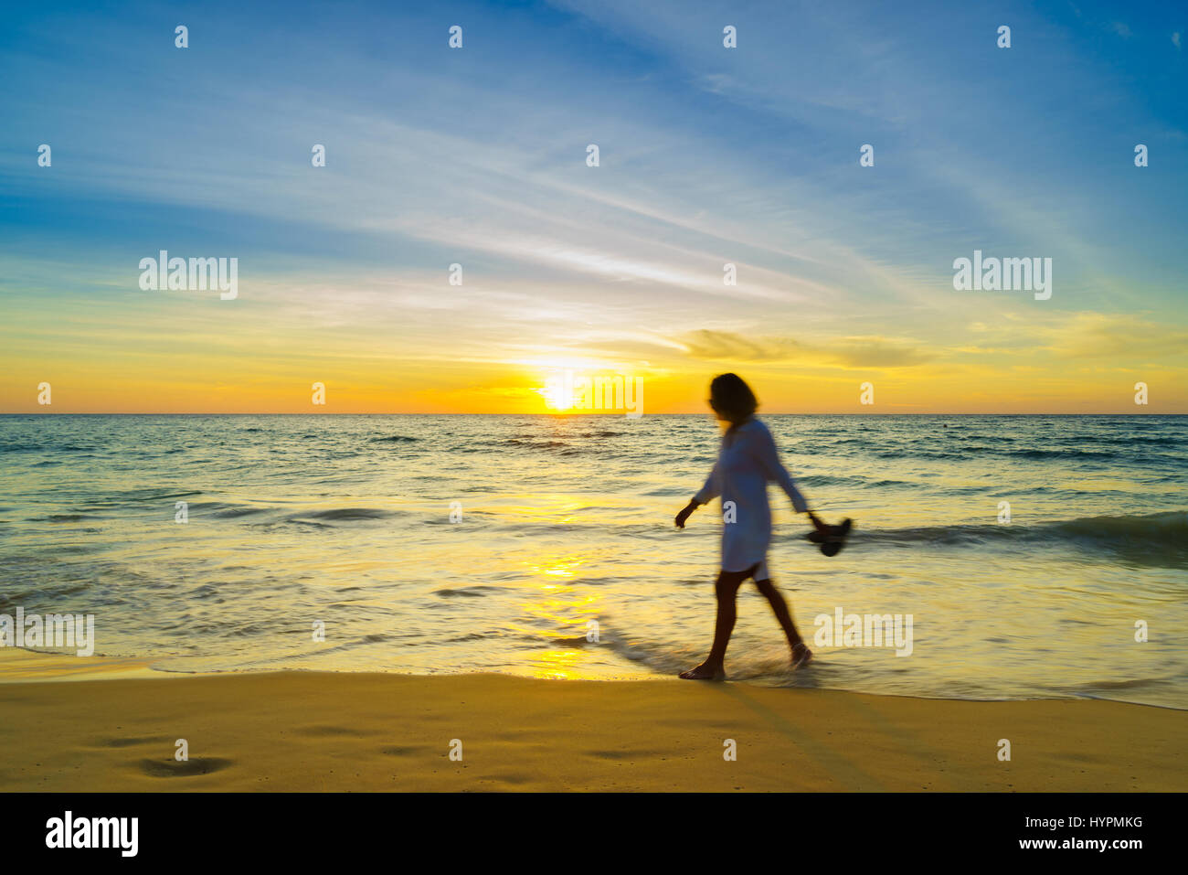 Beautiful woman laying on beach hi-res stock photography and images - Alamy