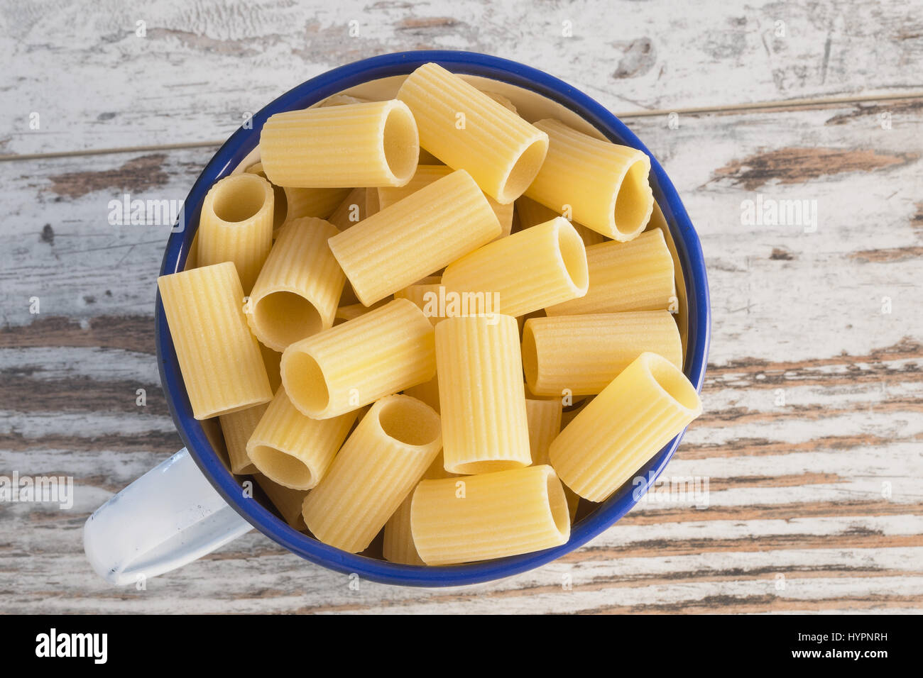 dried pasta in cup metallic half-sleeves Elevated rigate Stock Photo