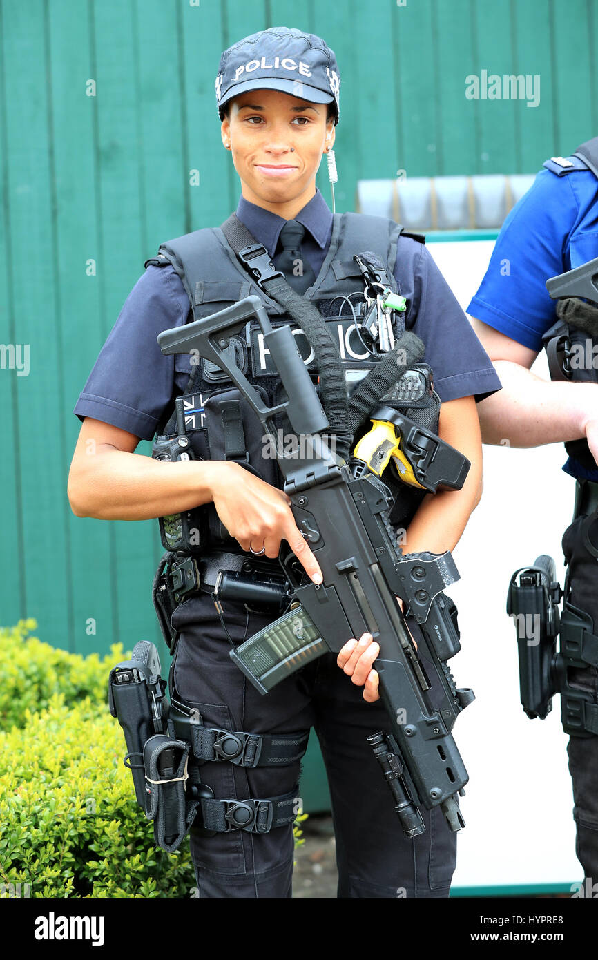 An armed female police officer during day one of the Randox Health