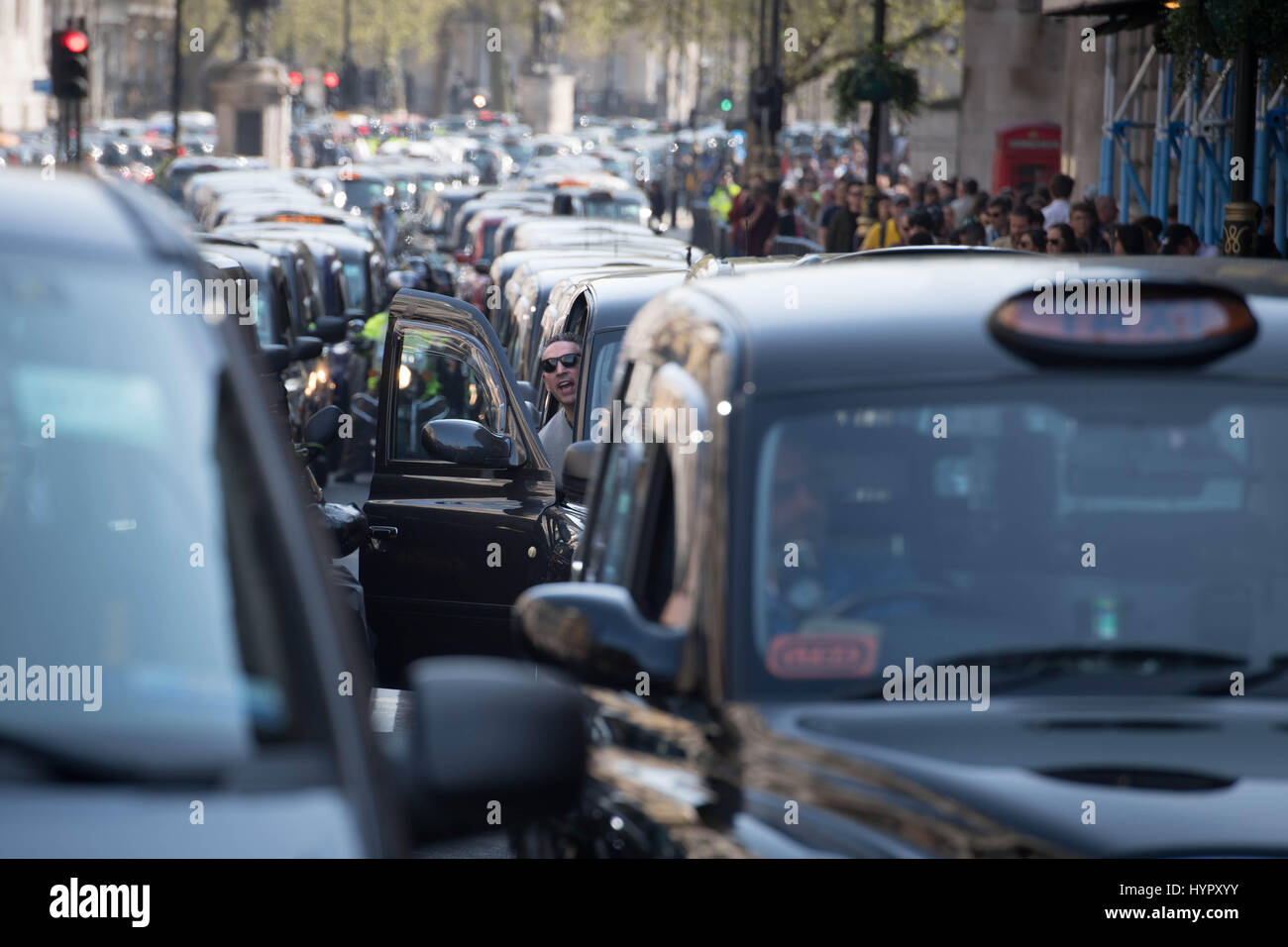 London black cab drivers hold a demonstration in Whitehall during a protest against government public transport plans. Stock Photo