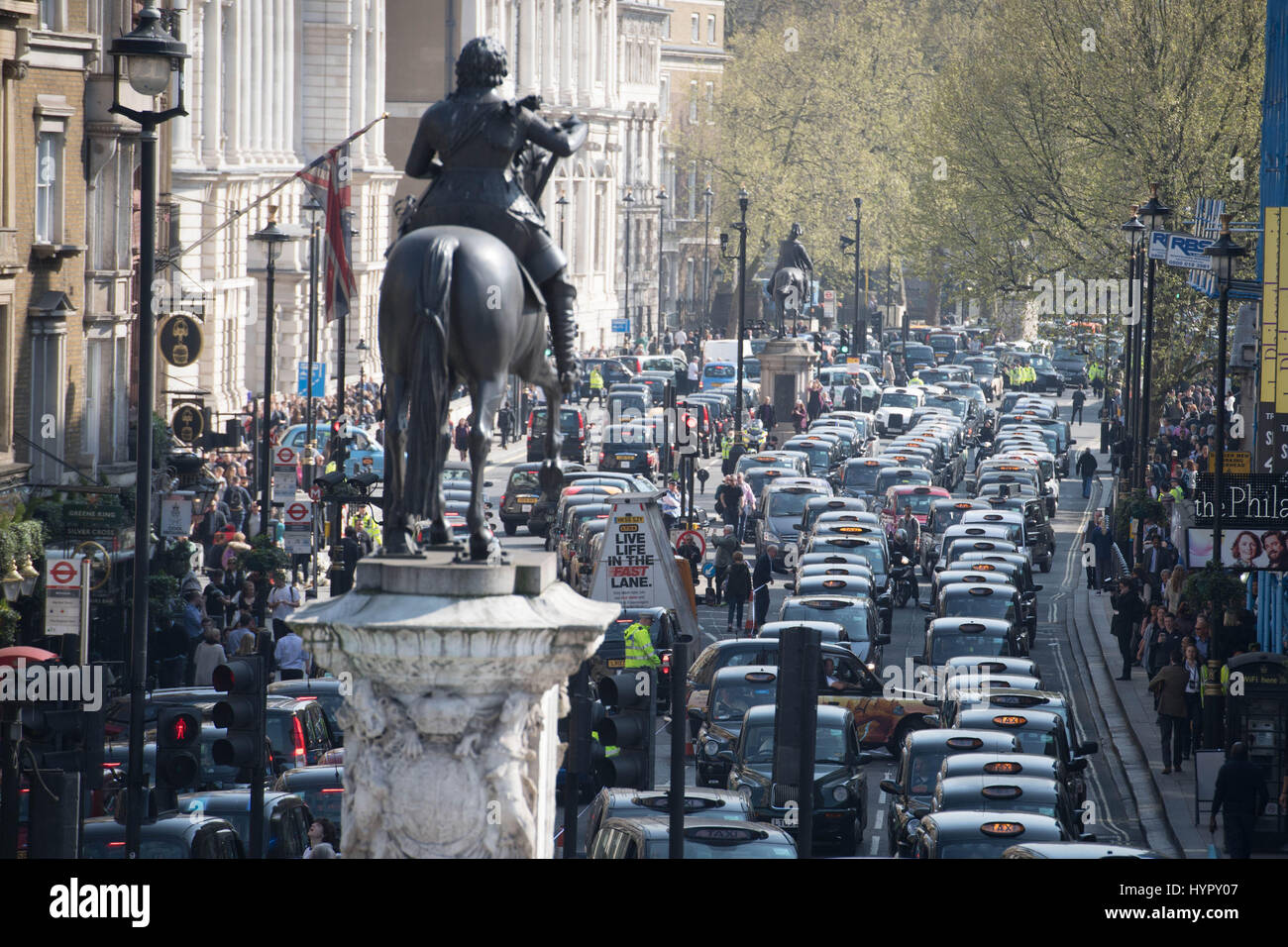 London black cab drivers hold a demonstration in Whitehall during a protest against government public transport plans. Stock Photo