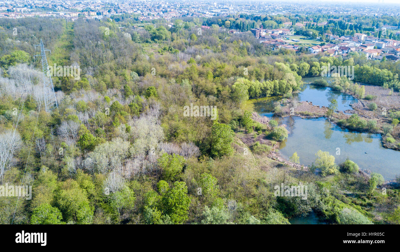 Nature and landscape: Aerial view of a forest and lakes, green and trees in a wild landscape. Groane Park, Mombello (Laghettone), Limbiate, Milano, It Stock Photo