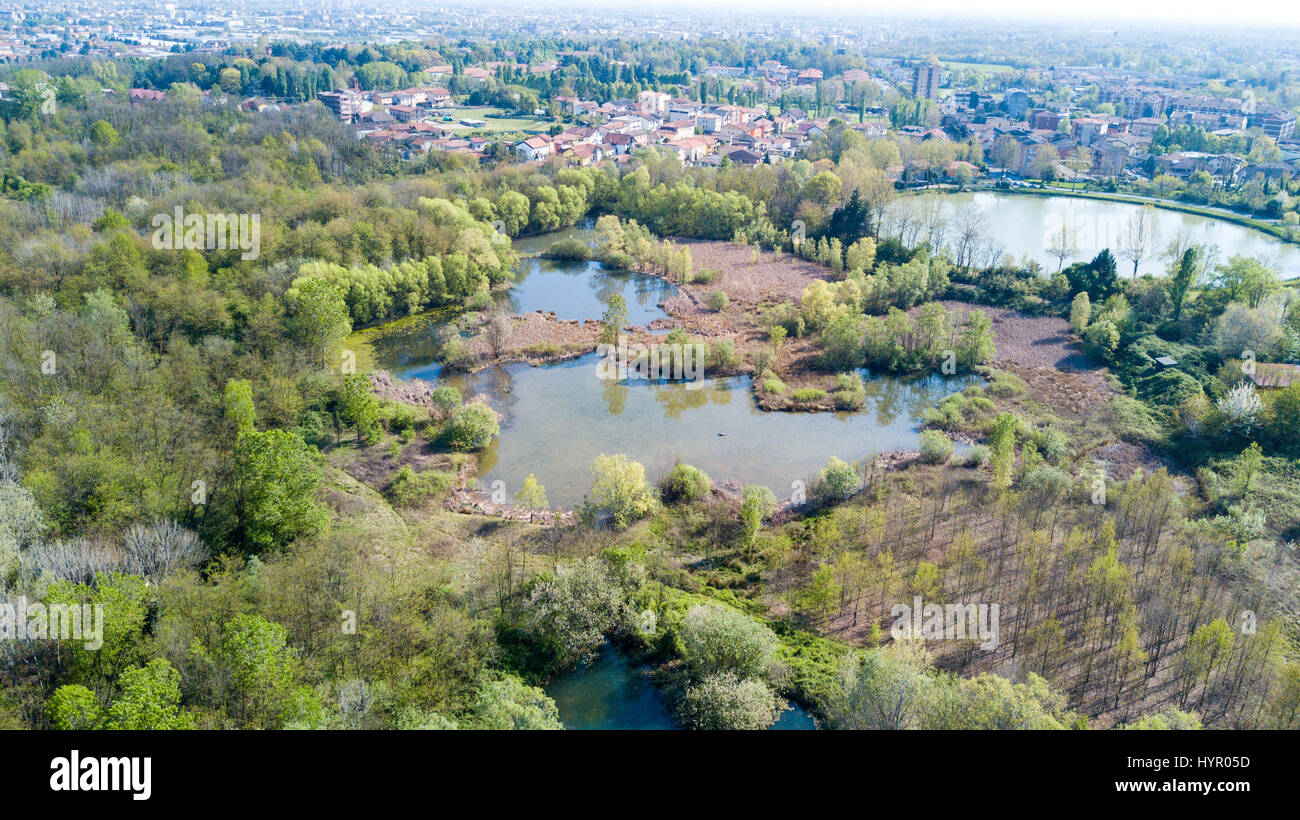 Nature and landscape: Aerial view of a forest and lakes, green and trees in a wild landscape. Groane Park, Mombello (Laghettone), Limbiate, Milano, It Stock Photo