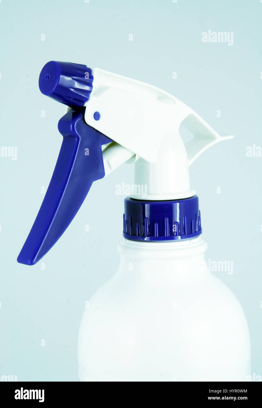 Watering sprayer. Blue and white plastic bottle sprayer. Stock Photo