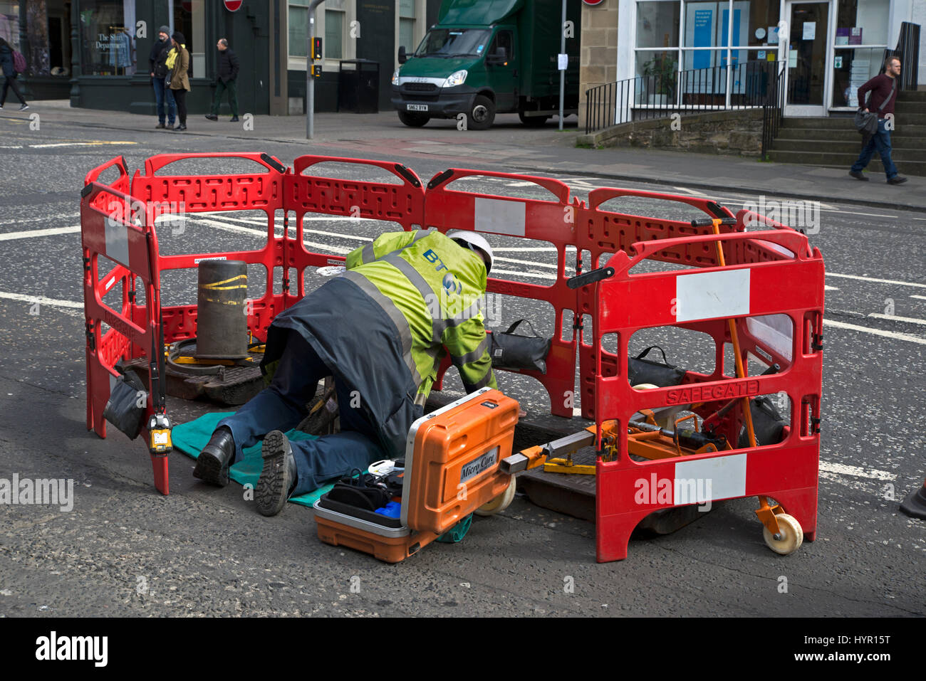 BT engineer working on underground cables in Frederick Street in