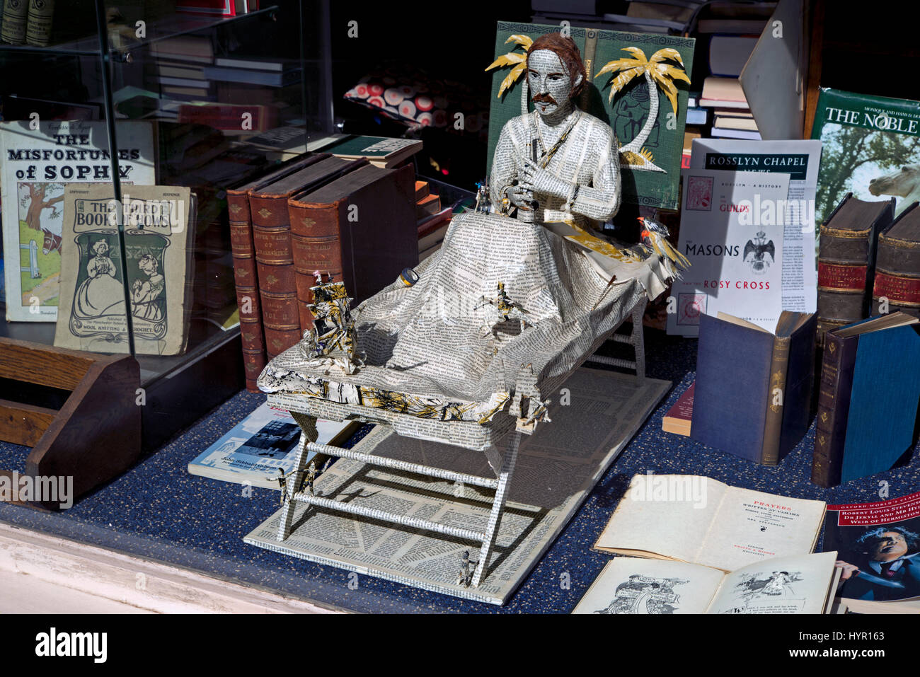 A model of Robert Louis Stevenson made from the pages of a book in the window of a secondhand bookshop in Edinburgh, Scotland, UK. Stock Photo