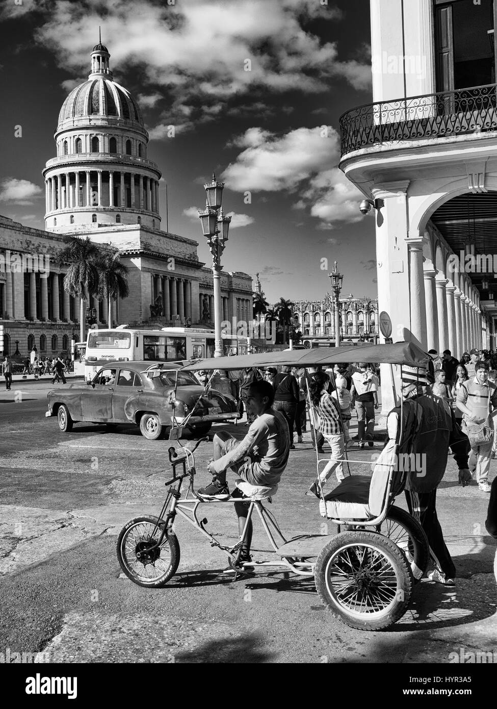 Bici-taxi in front of the Capitol in Havana, Cuba Stock Photo