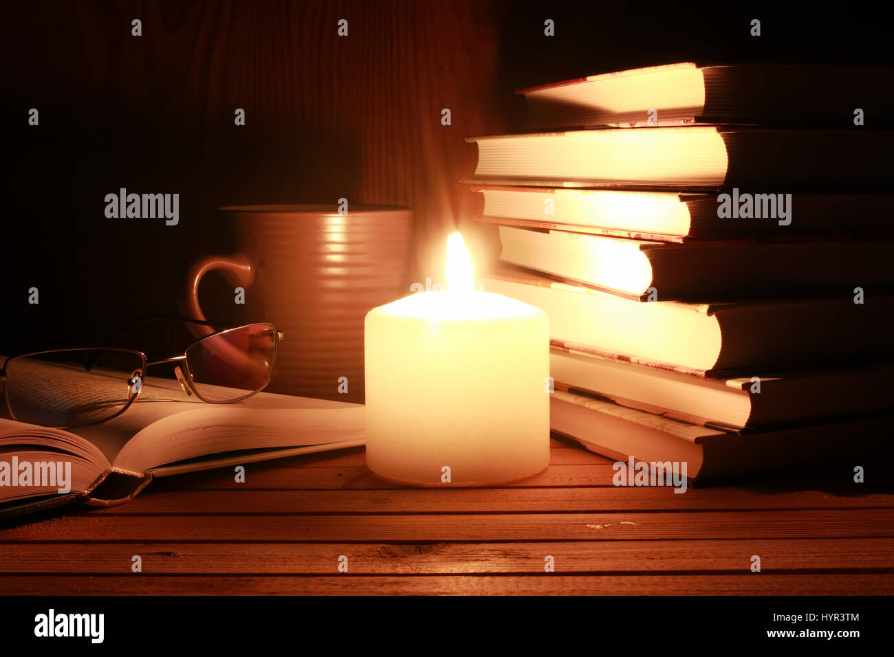 Reading Books By Candle Light High Resolution Stock Photography and