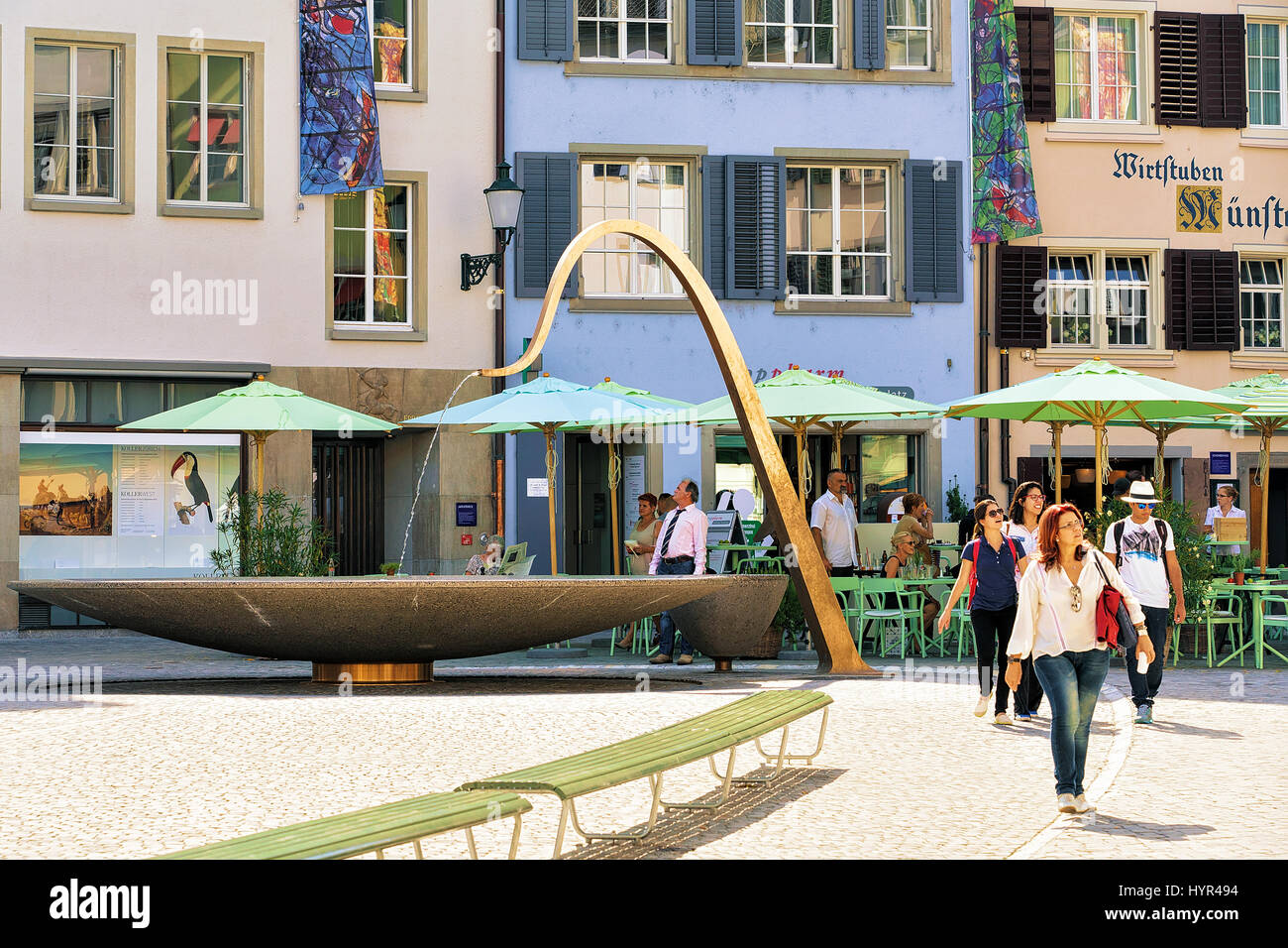 Zurich, Switzerland - September 2, 2016: Fountain and people at Munsterhof square in Zurich, Switzerland Stock Photo